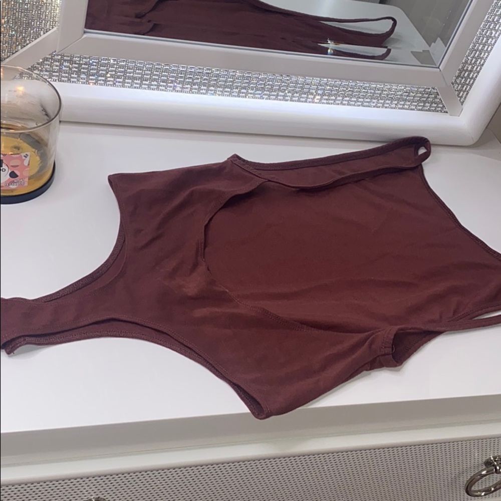 Backless brown body suit 🤠